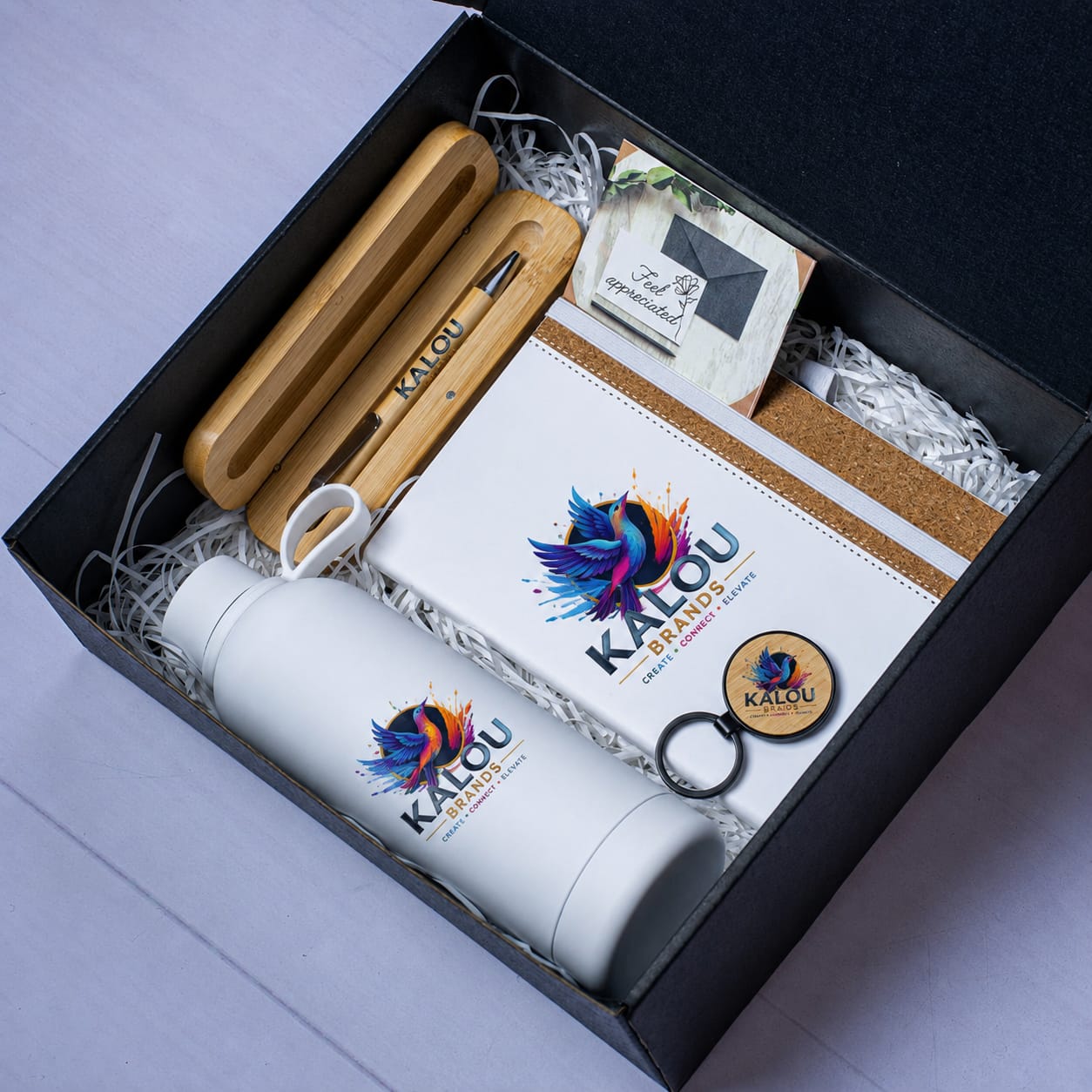 White gift box with branded items